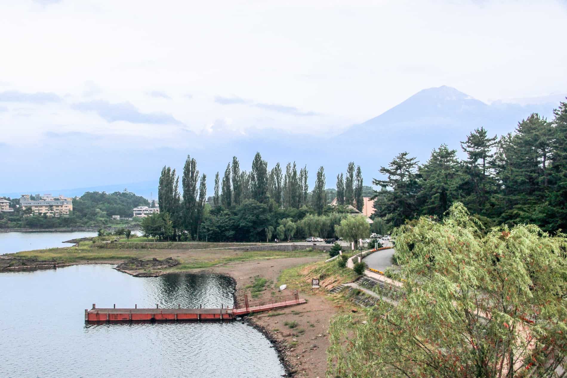 Scenic, forest set Lake Kawaguchiko in the Fuji Five Lakes region in Japan, with a view to Mt. Fuji. 