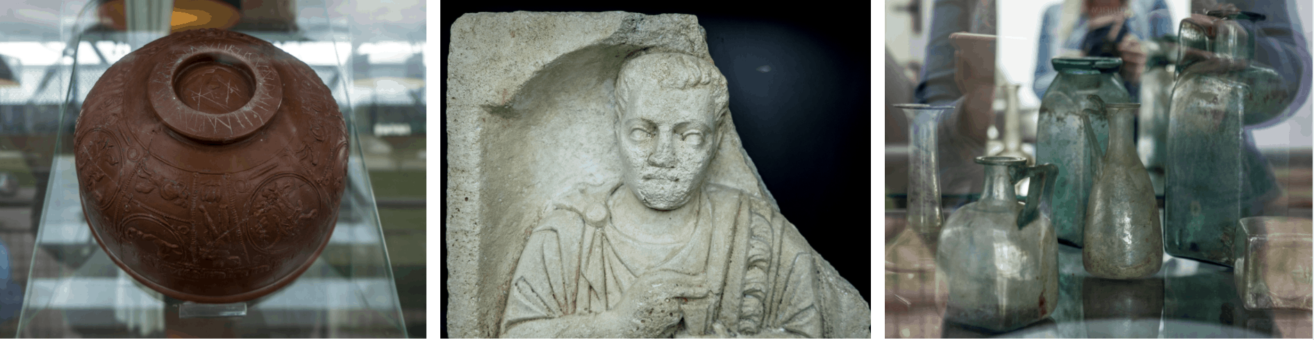 Pottery, a tombstone and glassware objects on display at the site of Roman city Flavia Solva in southern Austria