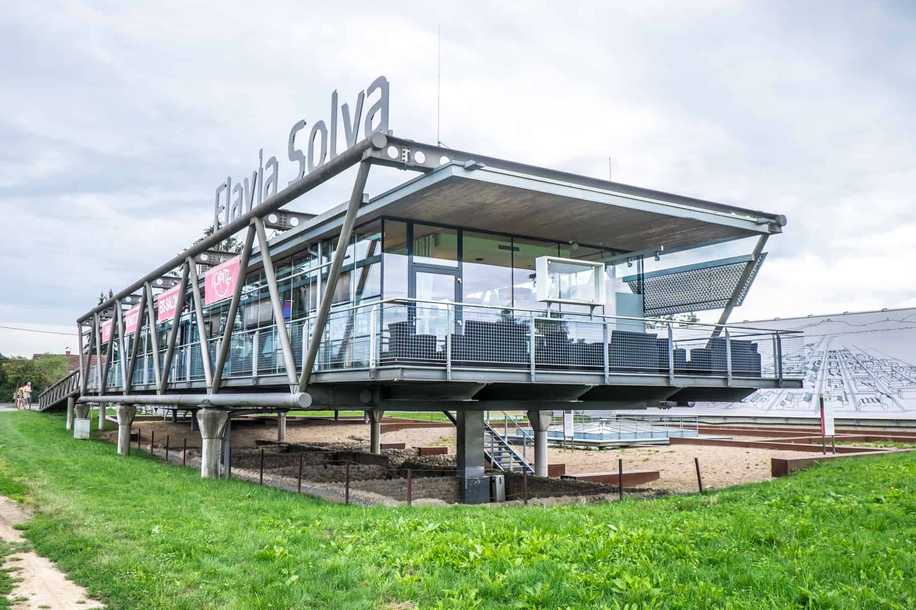 A modern glass fronted cafe and museum at the excavation site of Flavia Solva in South Styria, Austria