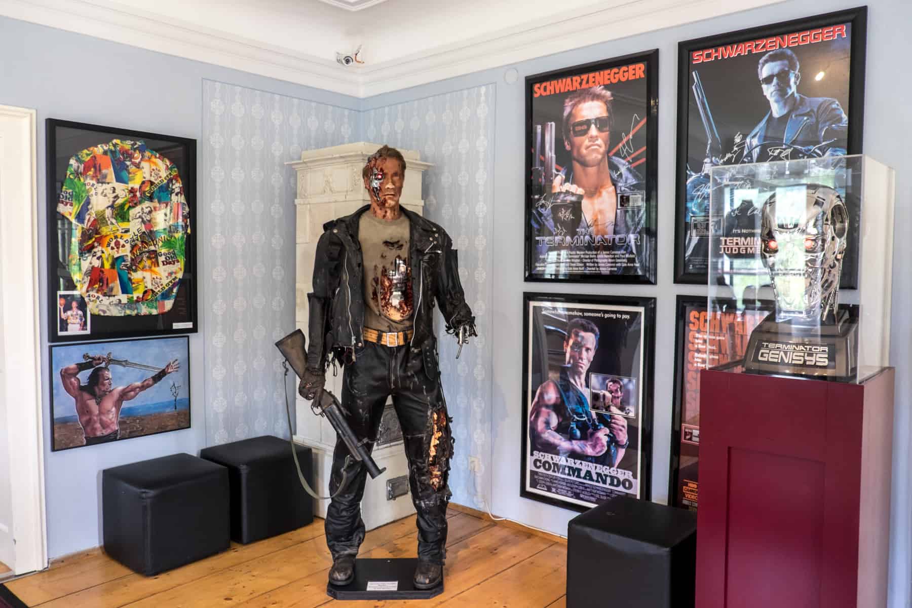 A Terminator film prop figurine and a room fileld with film posters at the Terminator figure Arnold Schwarzenegger Museum near Graz, Austria