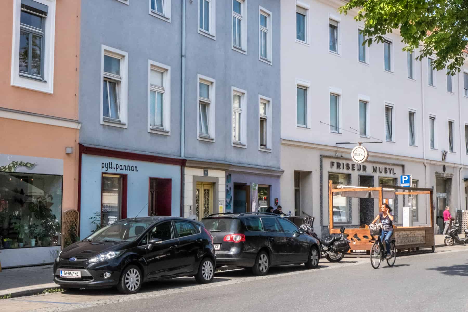 Orange, baby blue and white building of the trendy Lend residential district in Graz, Austria