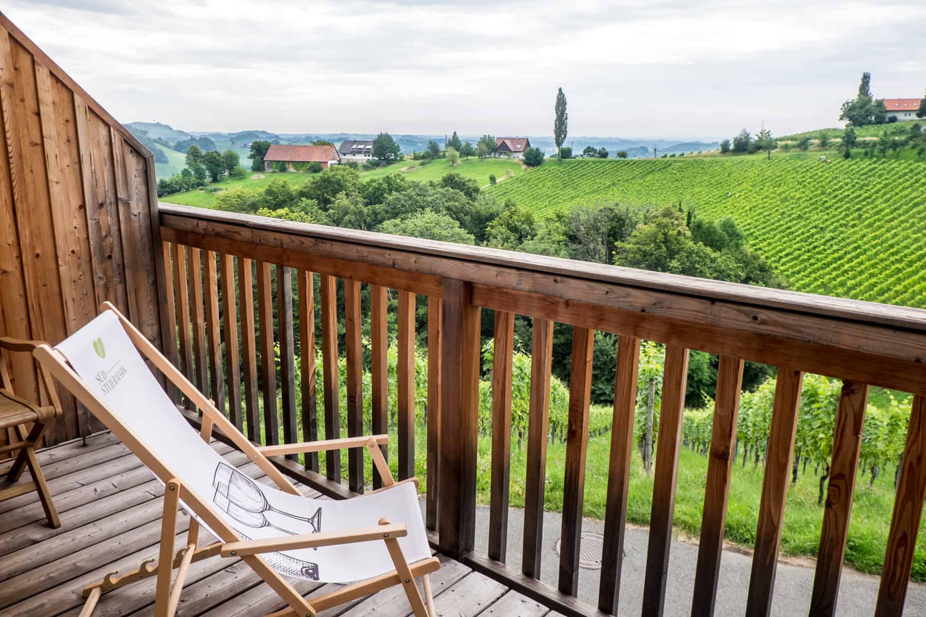 View to the green winelands from the bedroom balcony at Weingut Dreisiebner Stammhaus in Gamlitz Styria Austria