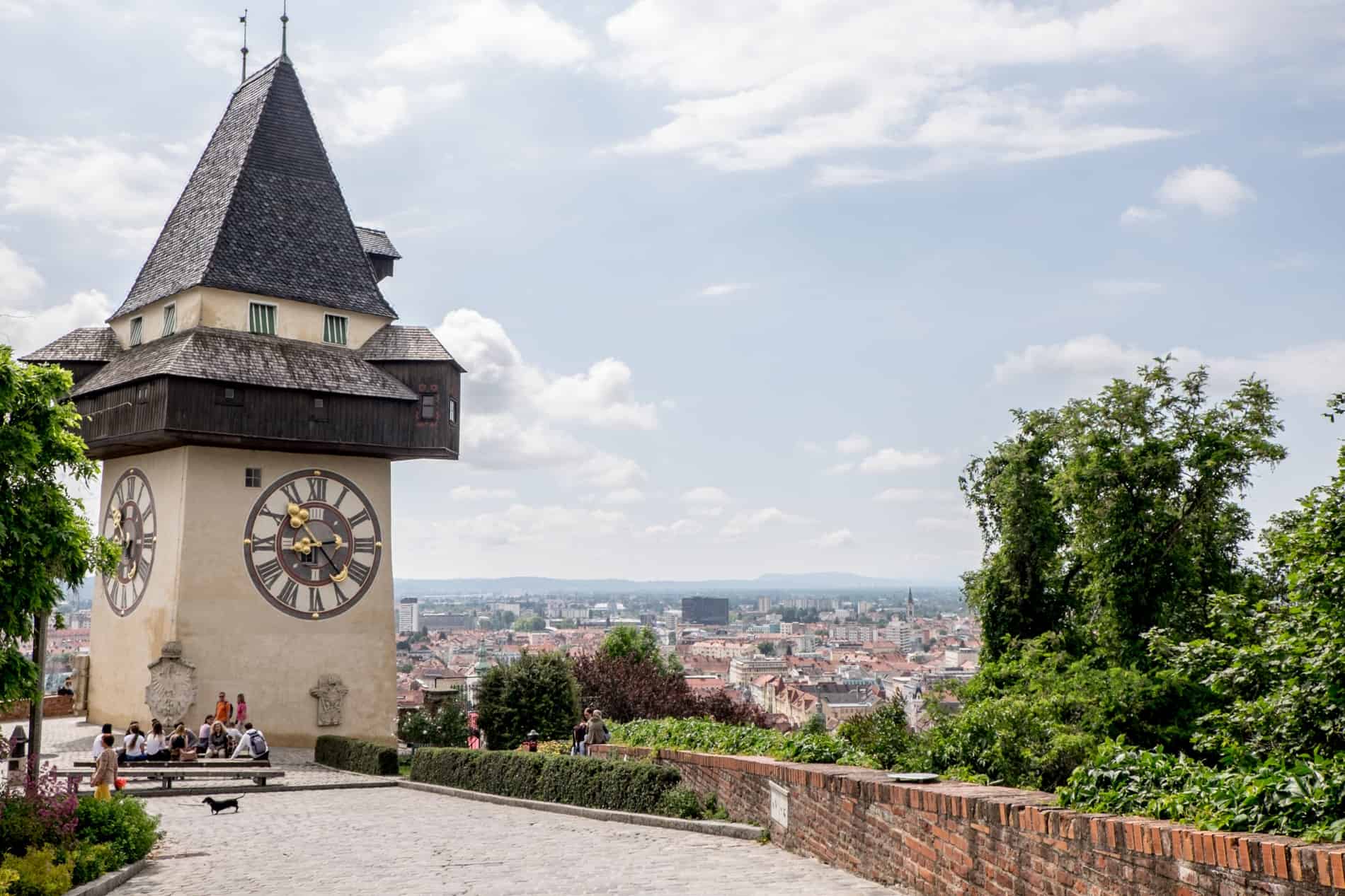 The small triangular roofed Clock Tower on a hill in Graz with a sweeping view over the city. 