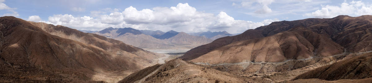 Panoramic view of the brown hilly, Kambalaat Pass high road in Tibet