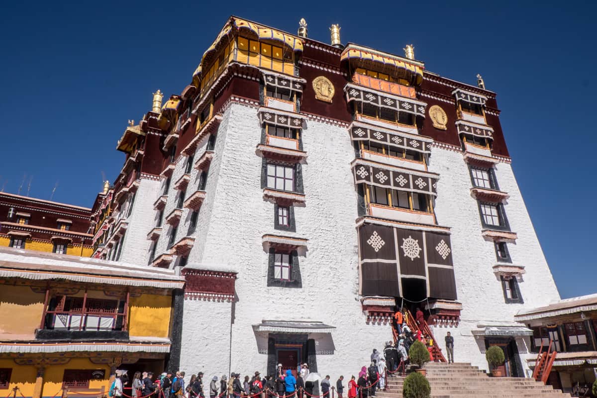 The queue at the entrance to Potata Palace in Lhasa, where those who travel Tibet are restricted to a 50 minute viewing slot