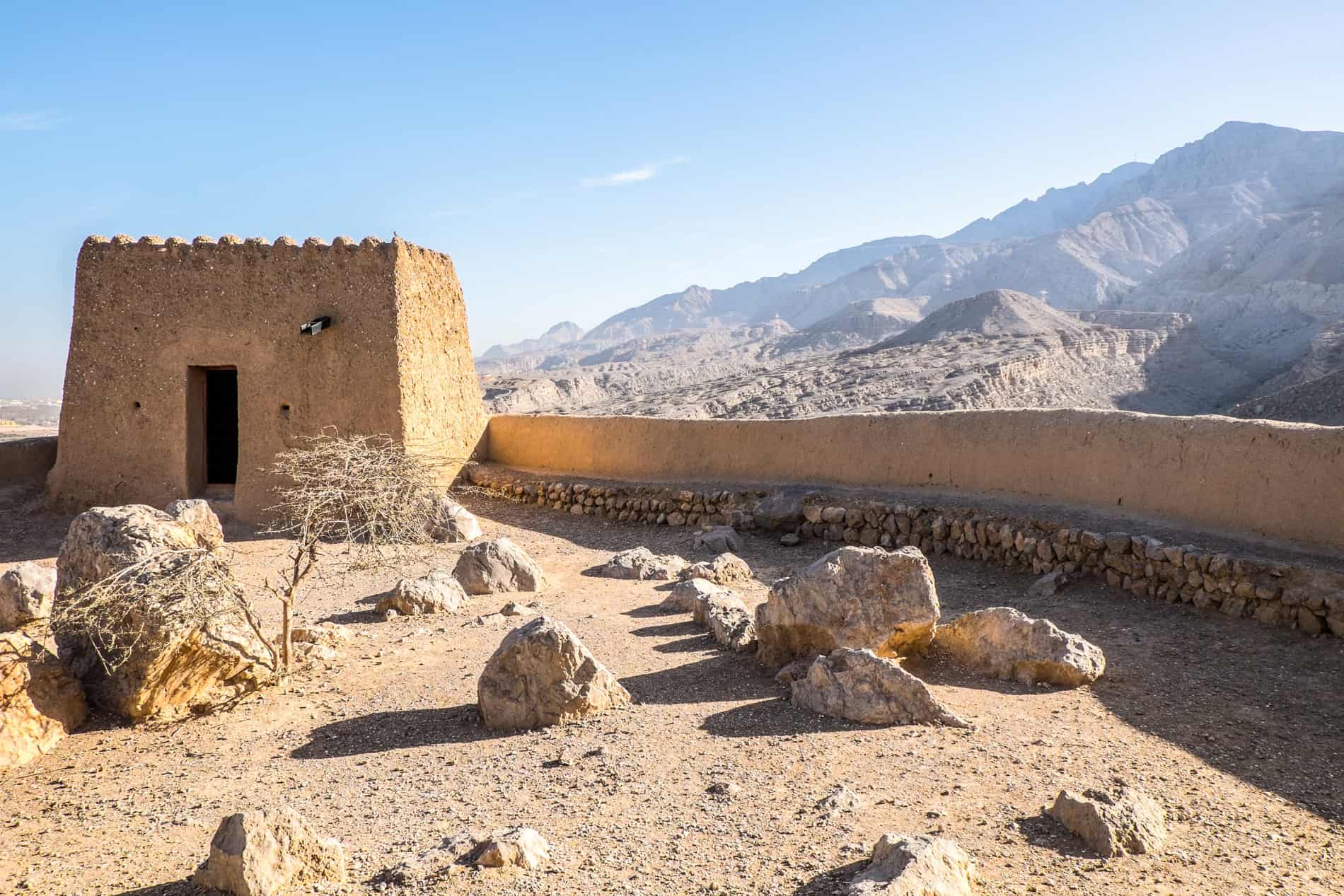 A turret and wall of the mud-brick fortress of Dhayah in Ras Al Khaimah. 