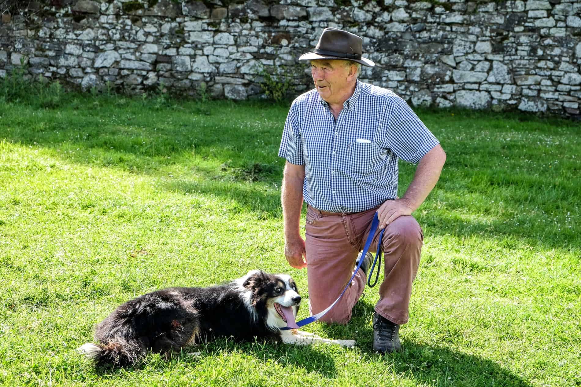 Joe O'Connor with his black and white dog at Jerpoint Park. 