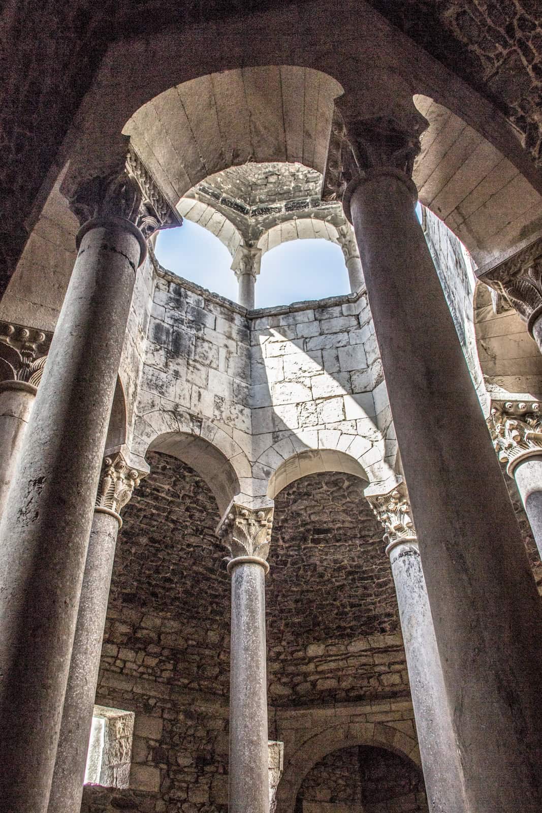 Remains of the white stone columned dome structure inside the Arab baths in Girona. 