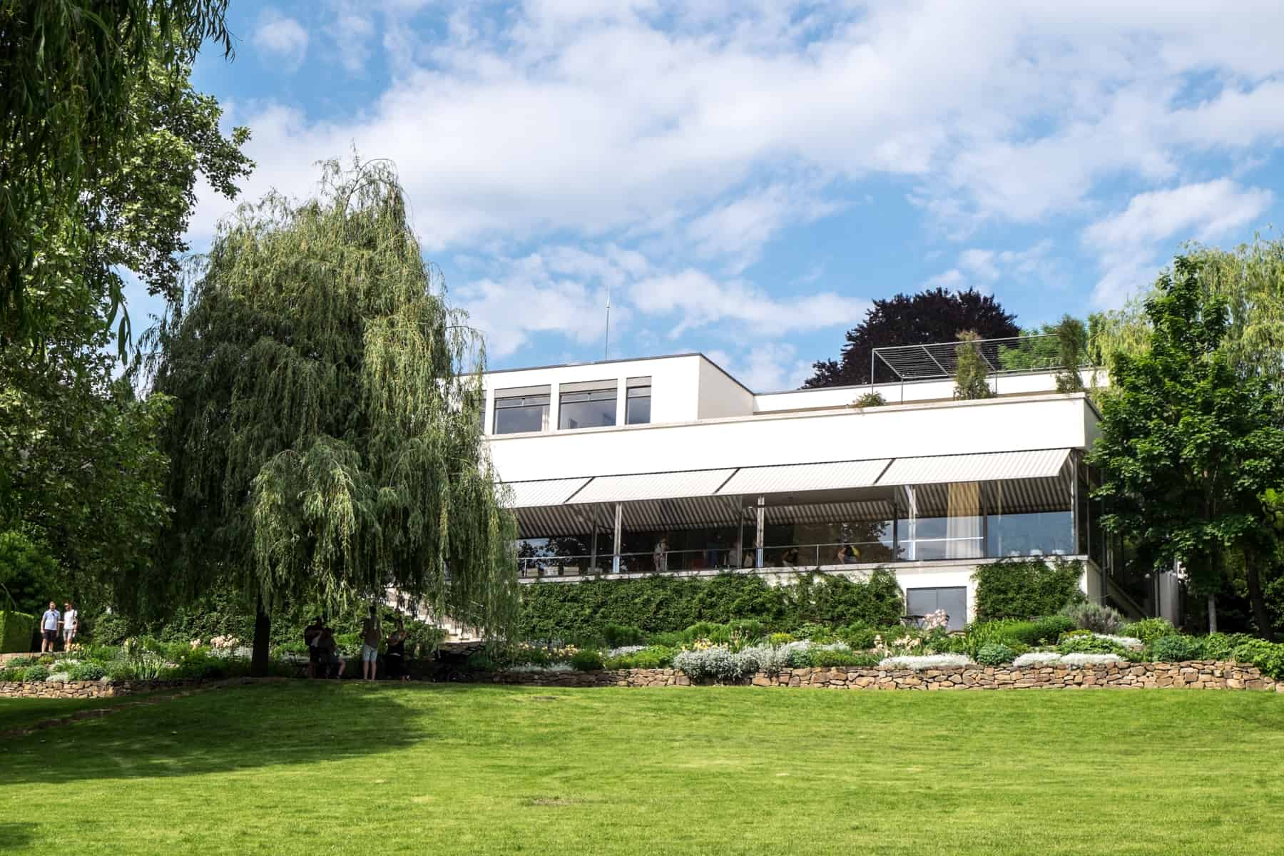 The long, white, functionalist style Villa Tugendhat in Brno - a Czech Republic UNESCO site. 