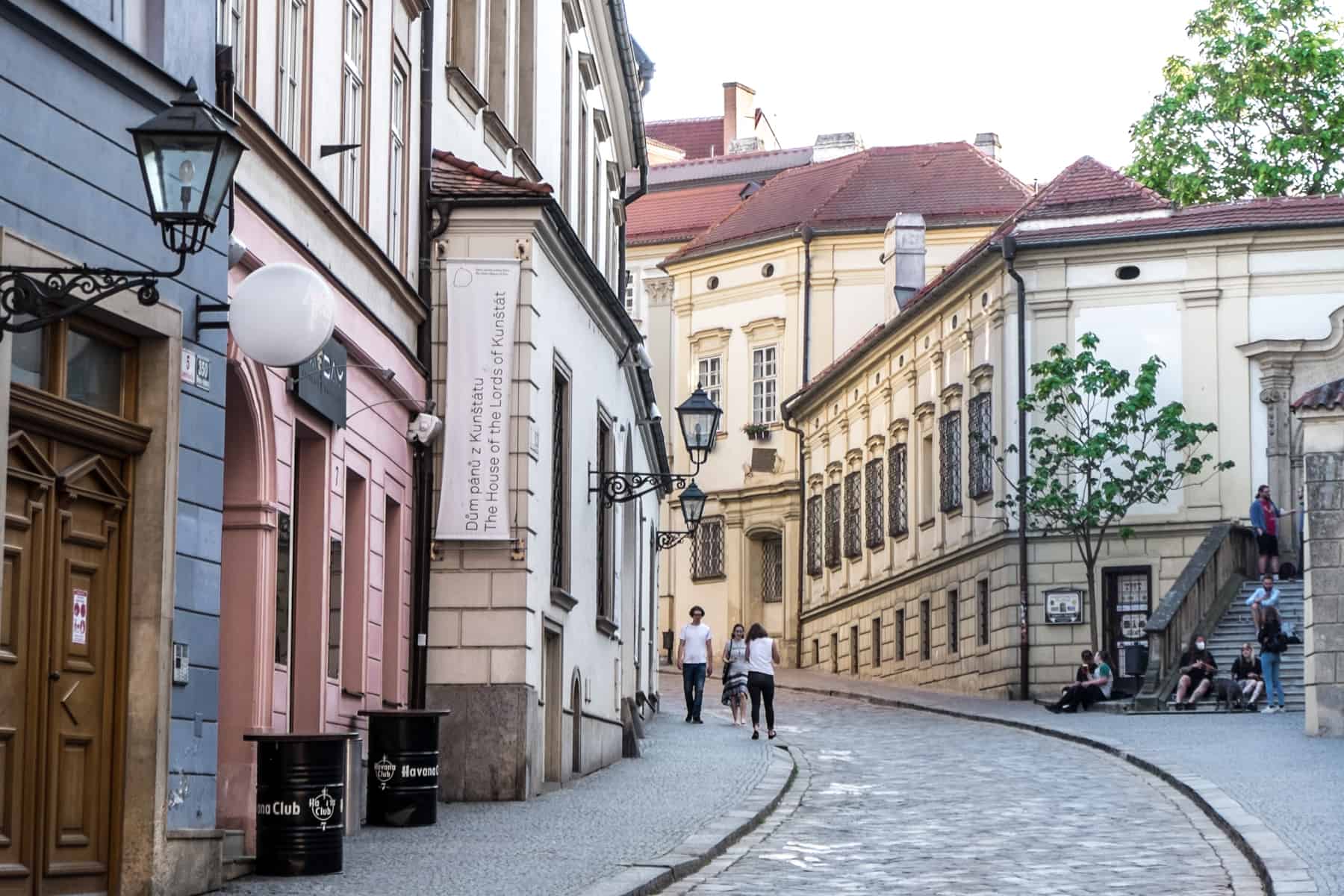 Candy coloured buildings on an old winding stone street of Brno, Czech Republic.