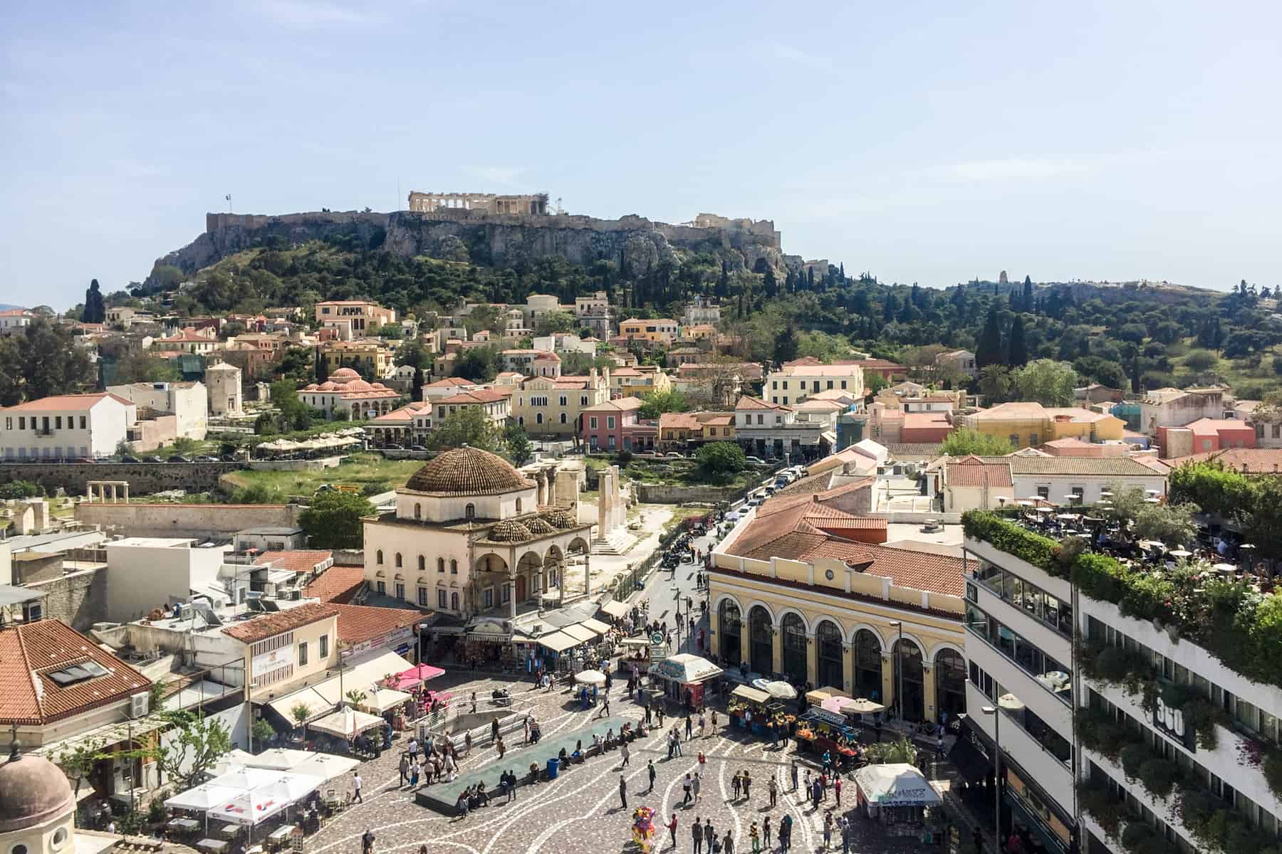 An elevated view of old Athens city looking over Monastiraki Square and towards the Acropolis. 