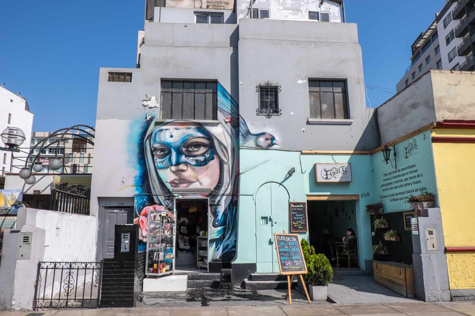 Street art on a small cafe and store building in the Miraflores neighbourhood of Lima.
