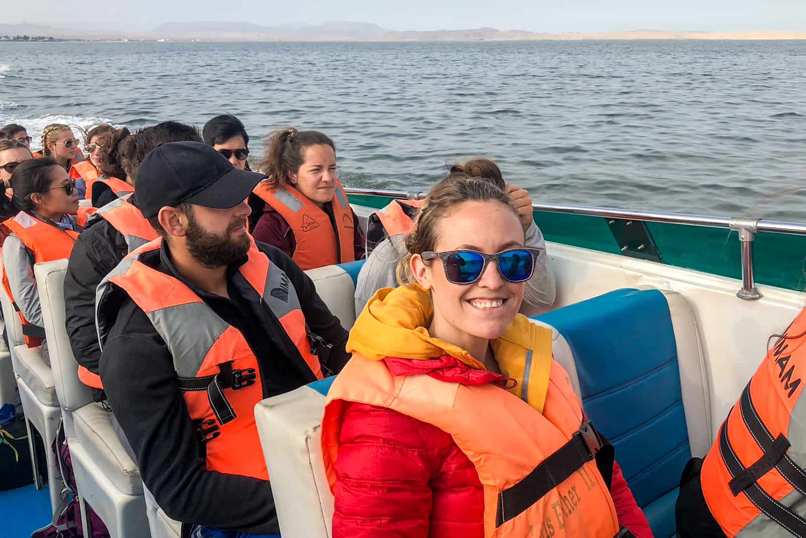 A tourist on a speed boat trip in Paracas, Peru. 