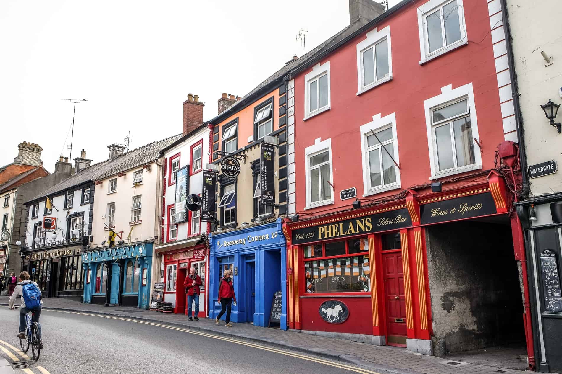 A row of multicoloured aged houses on Pub Street in Kilkenny's Medieval Mile. 