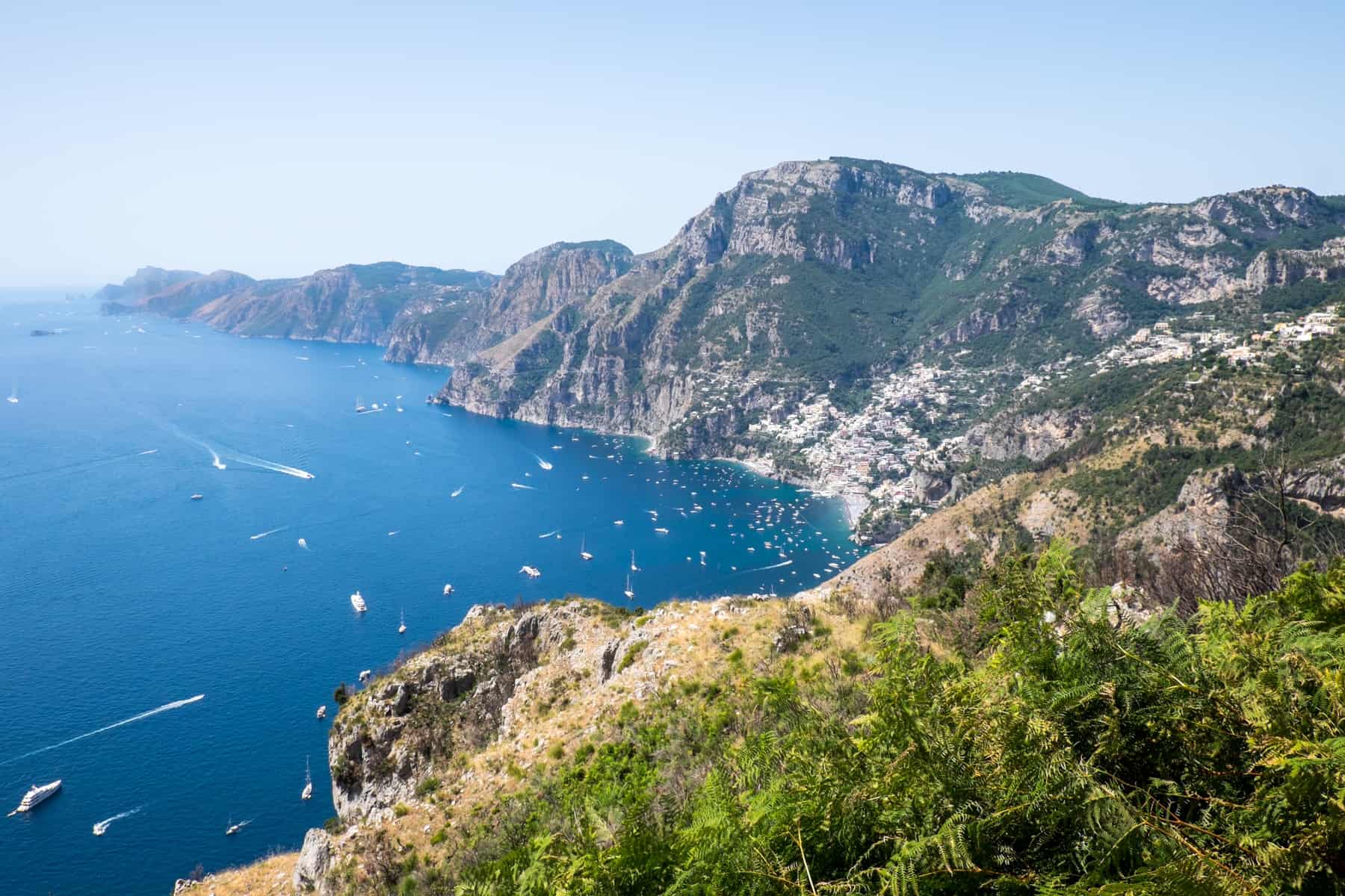 The best view on the Path of the Gods hike looking towards the town of Positano, the long line of mountains and Capri island at the very end. 