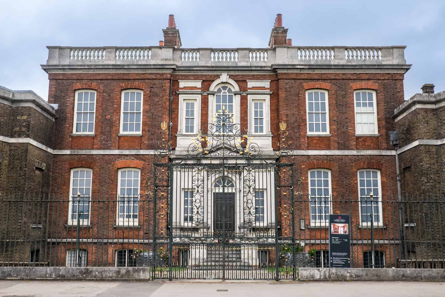 The red brick, white windowed, black gated Georgian villa in Greenwich, used as the Bridgerton house in filming. 