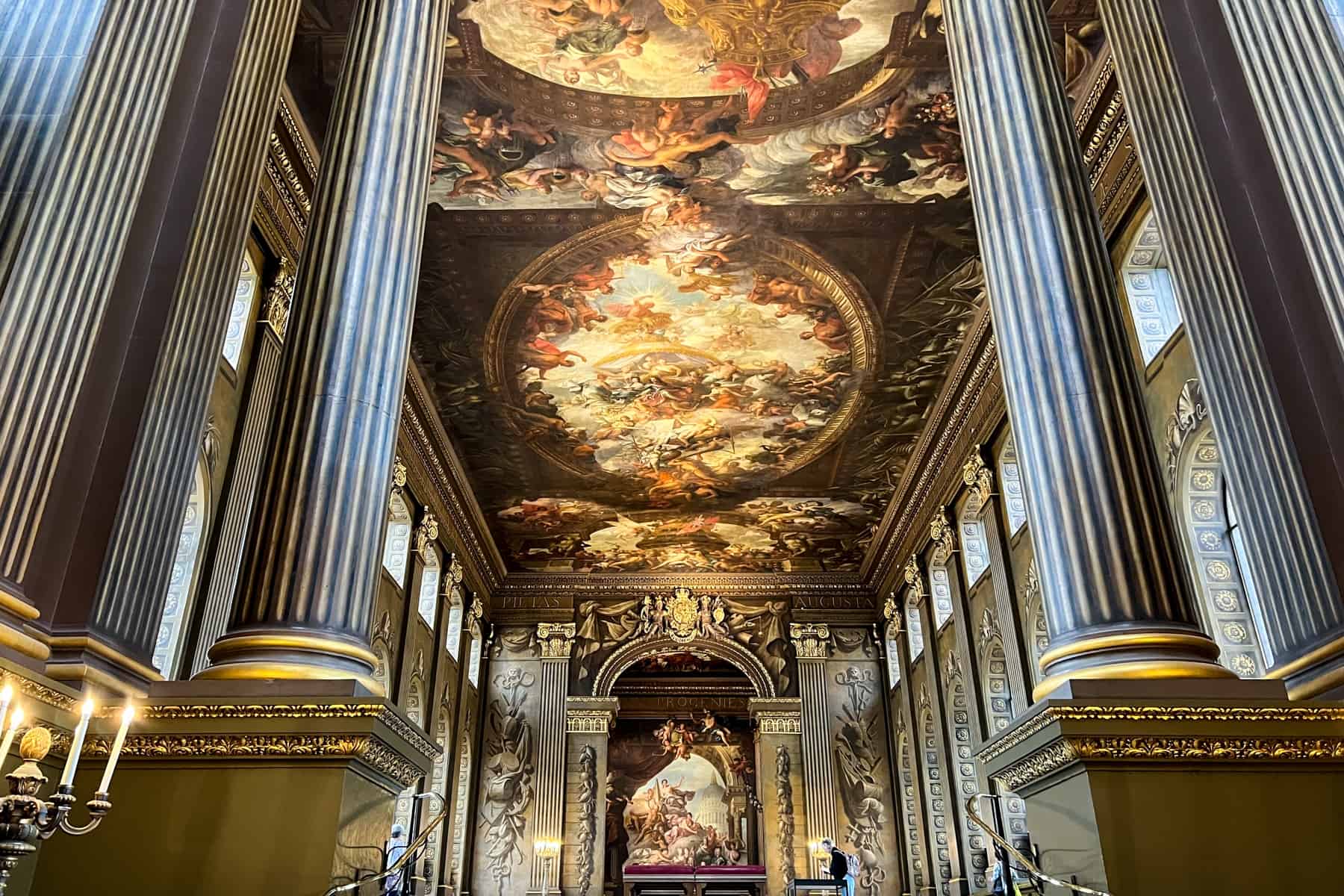 View from the columned entrance of the magnificent murals and luminous painted ceiling in the Painted Hall in Greenwich. 