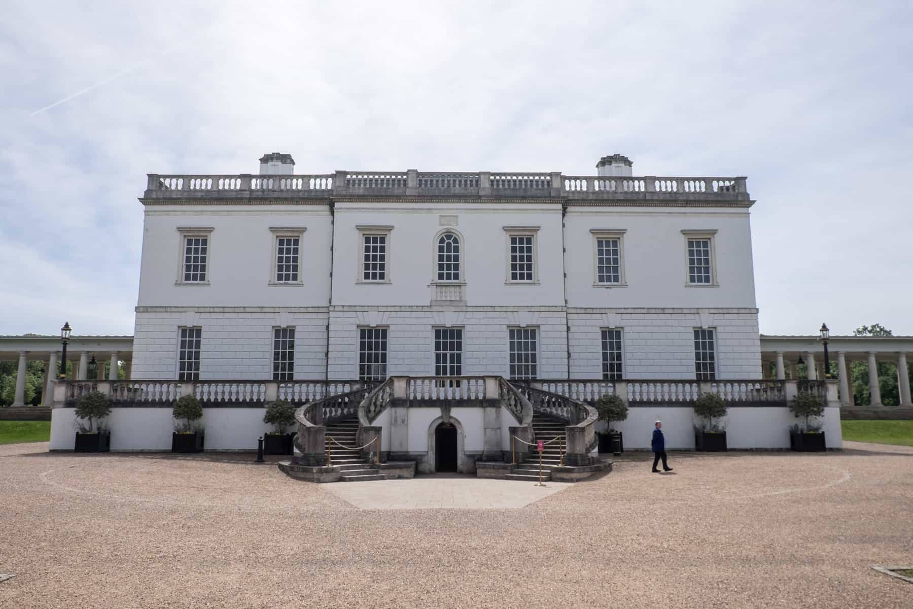 The stately white Queens House with double staircase and protruding side columns in Greenwich, London. 