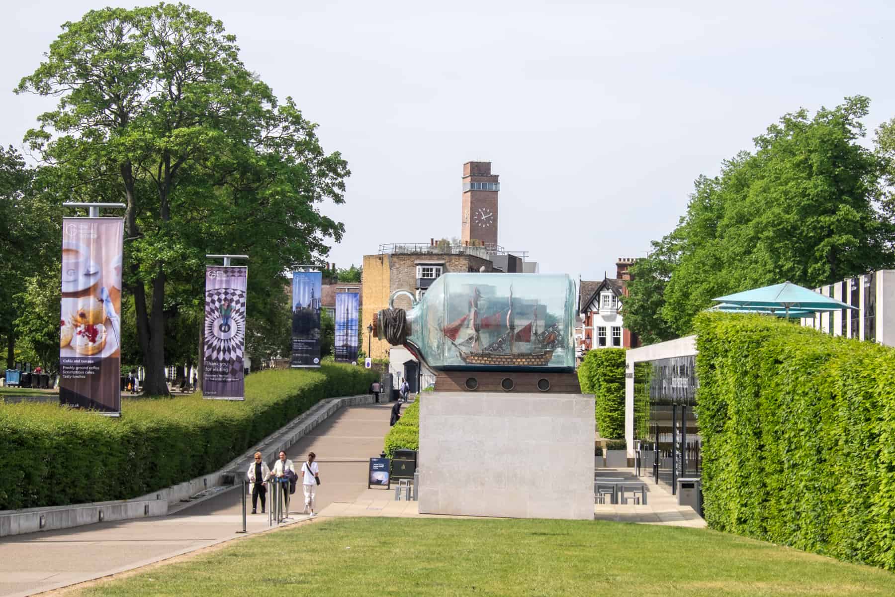 A giant ship in a bottle perched on a concrete square outside the National Maritime Museum in Greenwich.