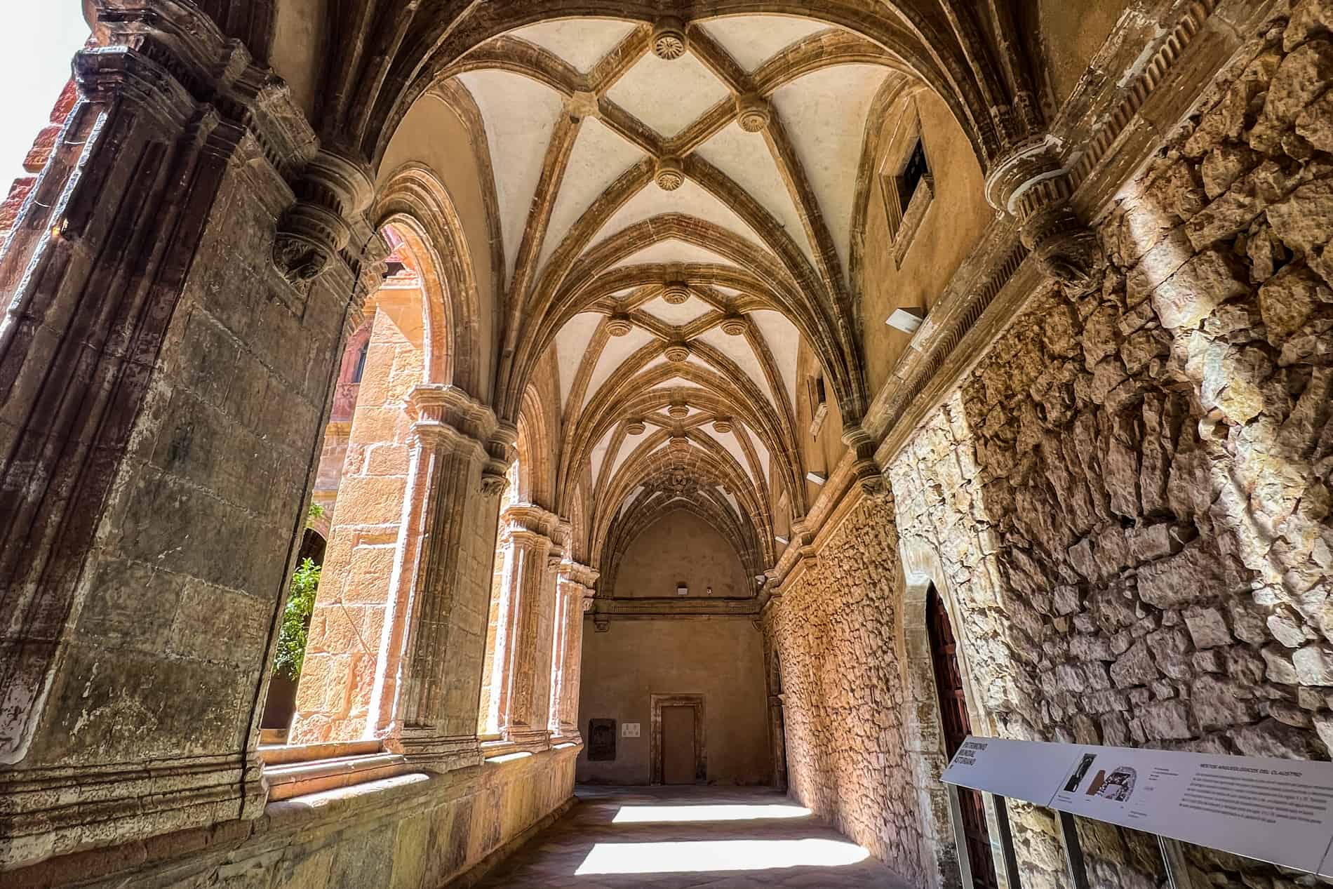 The stone-walled, vaulted ceilings of the cloister inside the Museo Arqueológico de Asturias (Archaeological Museum of Asturias) in Oviedo. 