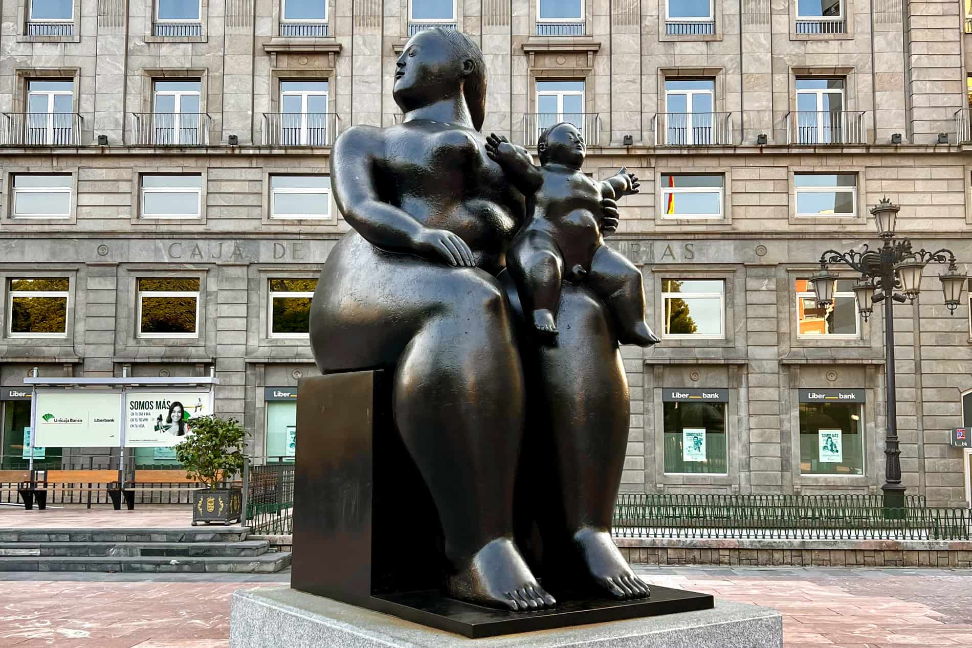 The 'La Maternidad' statue in Oviedo of an oversized and disproportionate mother and his child.