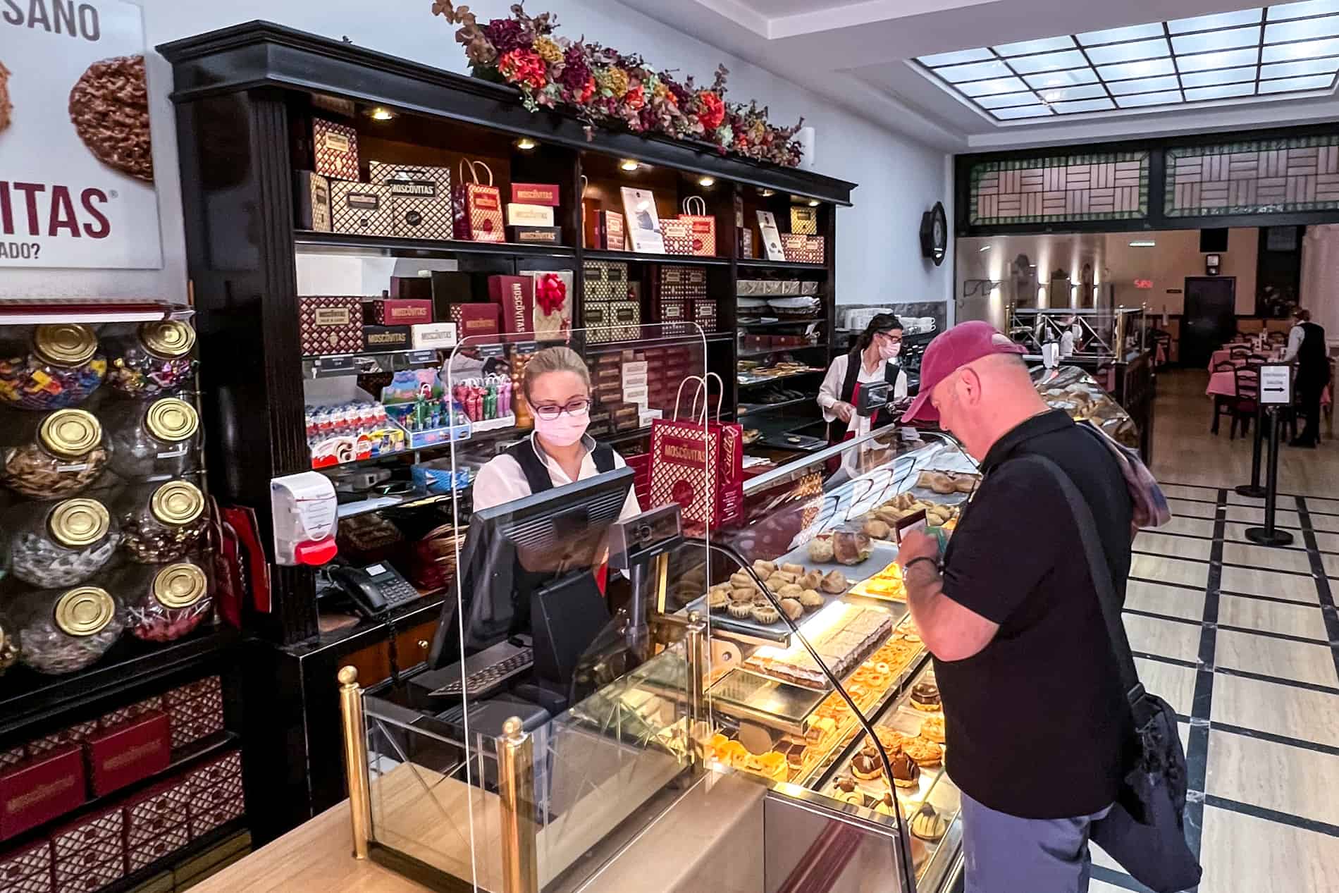 A man shops at Rialto in Oviedo for the best handmade confectionery in the city.