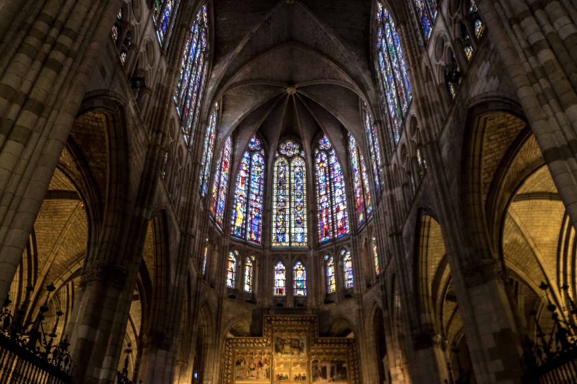The stained glass windows above the gothic alter place of León Cathedral, Spain. 