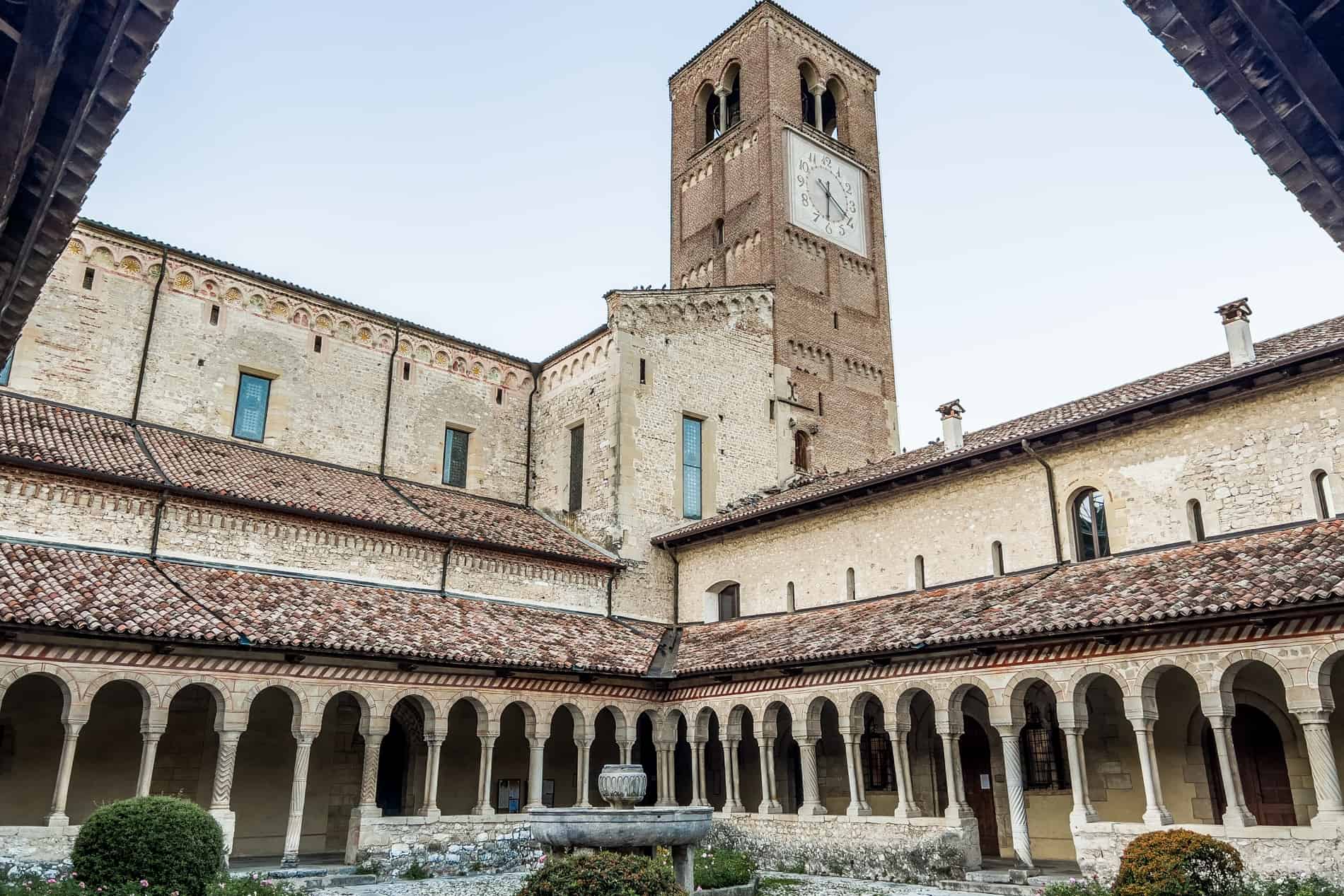 View from the cloister to the courtyard of the 13th-century Abbey of Santa Maria in Follina village. 