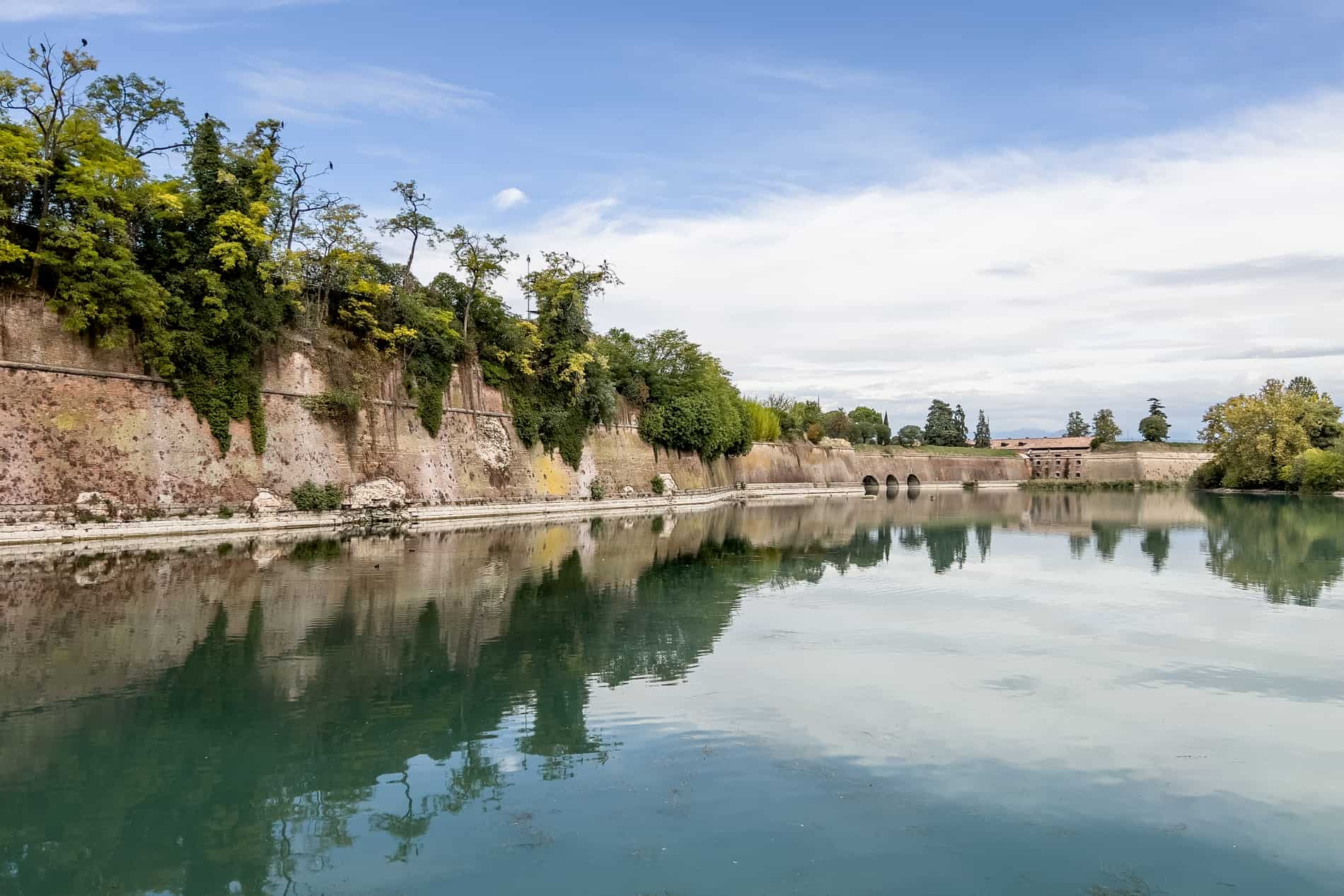 The preserved, waterside Venetian Republic defence walls surrounding Peschiera del Garda.