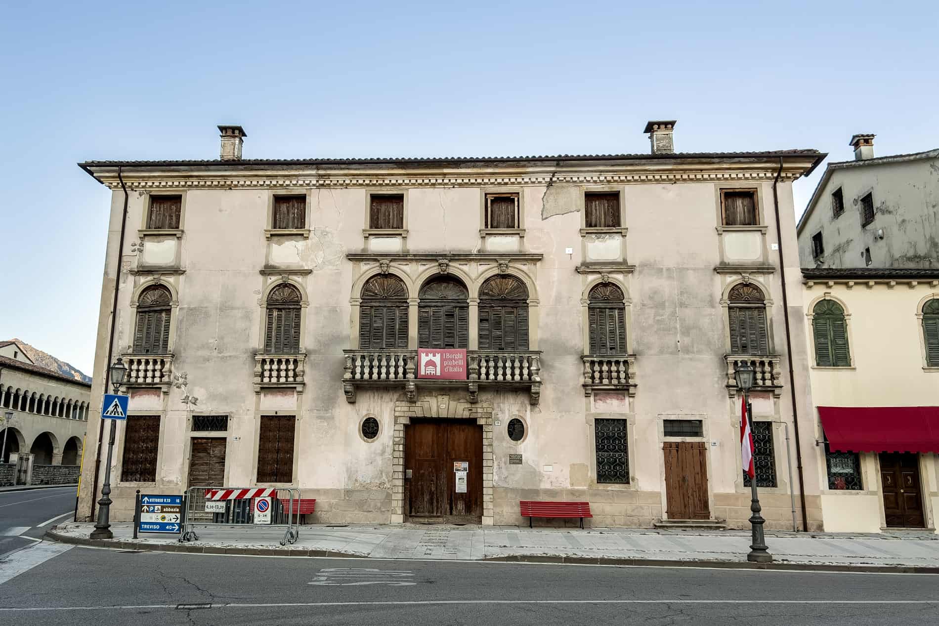 A 17th-century Palazzo with arched windows and wooden shutters - a former wool mill sit in Follina.