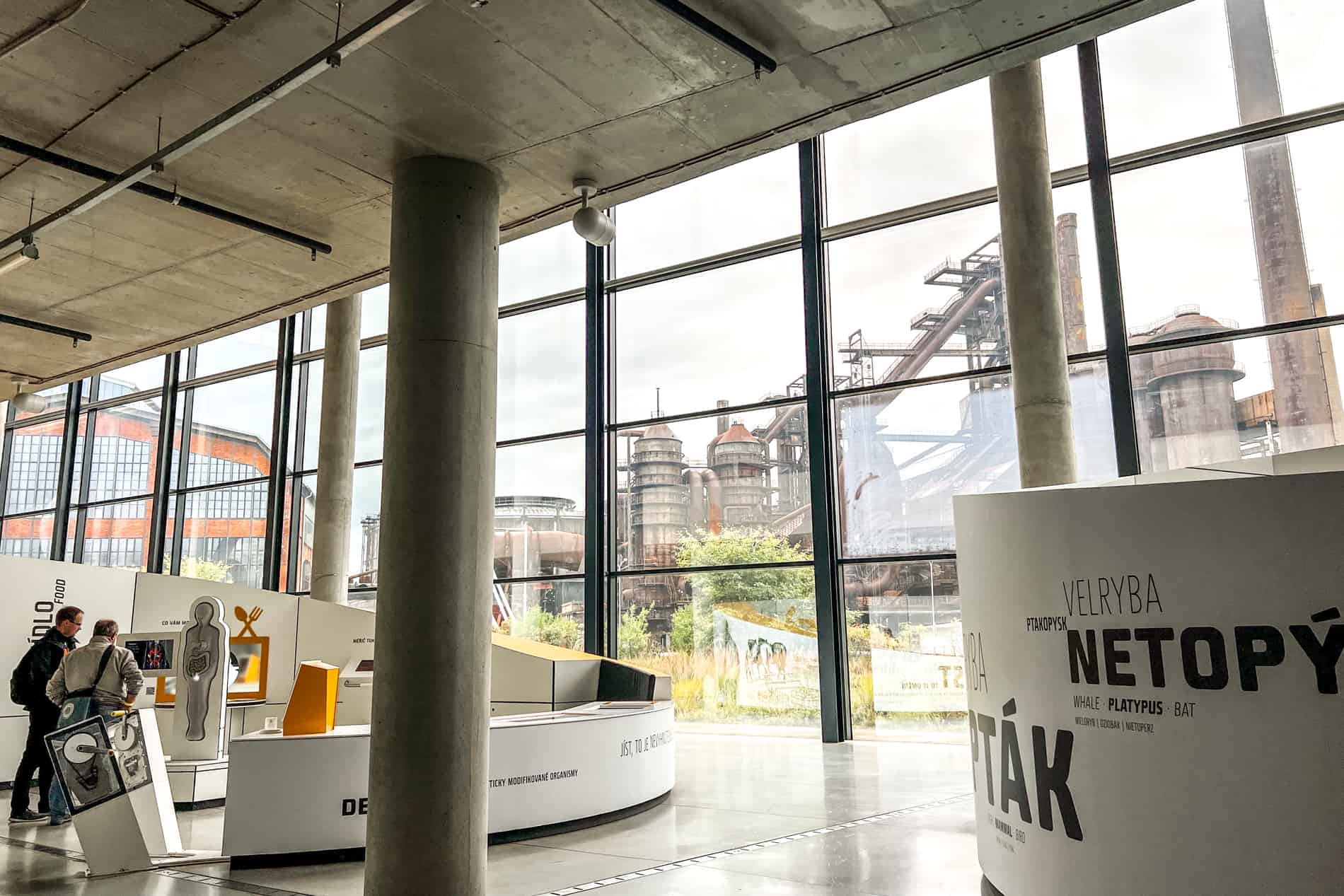 Inside the science museum in Ostrava looking out to the towers and pipes of the old industrial site.. 