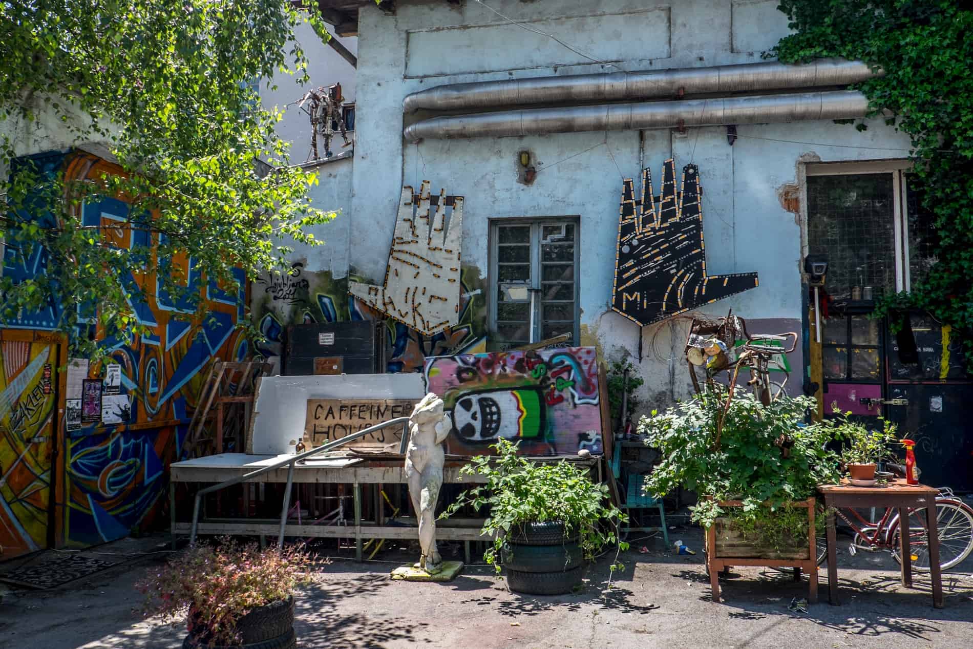 A bundle of art sculptures and paintings outside one of the studios of the repurposed building of the Rog Factory in Ljubljana city. 