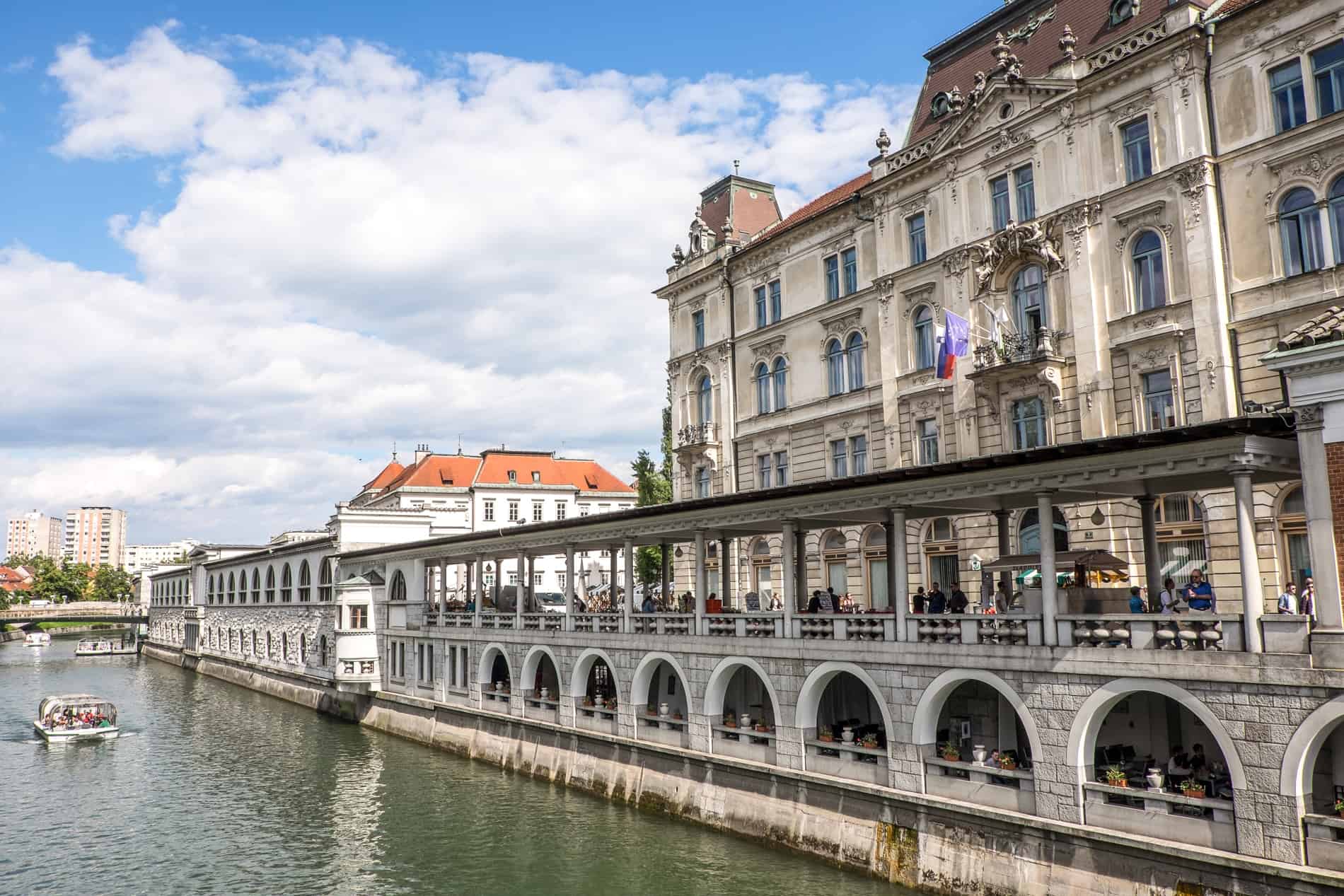 Riverside arched colonnade restaurant in Ljubljana, Slovenia. 