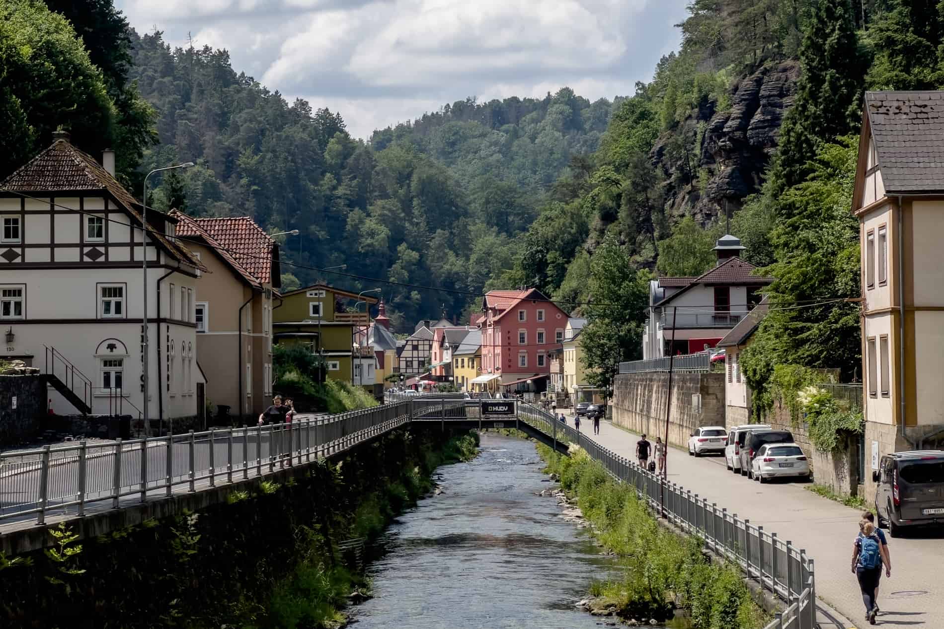 The pastel coloured houses of the riverside village of Hřensko in Bohemian Switzerland.