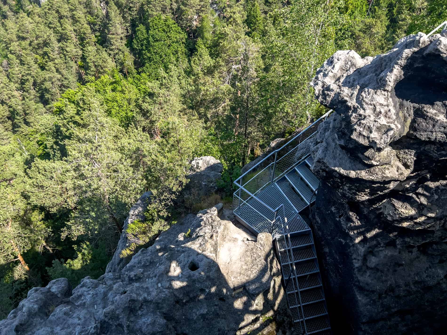 The metal stairway up the rock mound of Mary’s Viewpoint (Mariina Vyhlídka) in the forested Bohemian Switzerland National Park. 