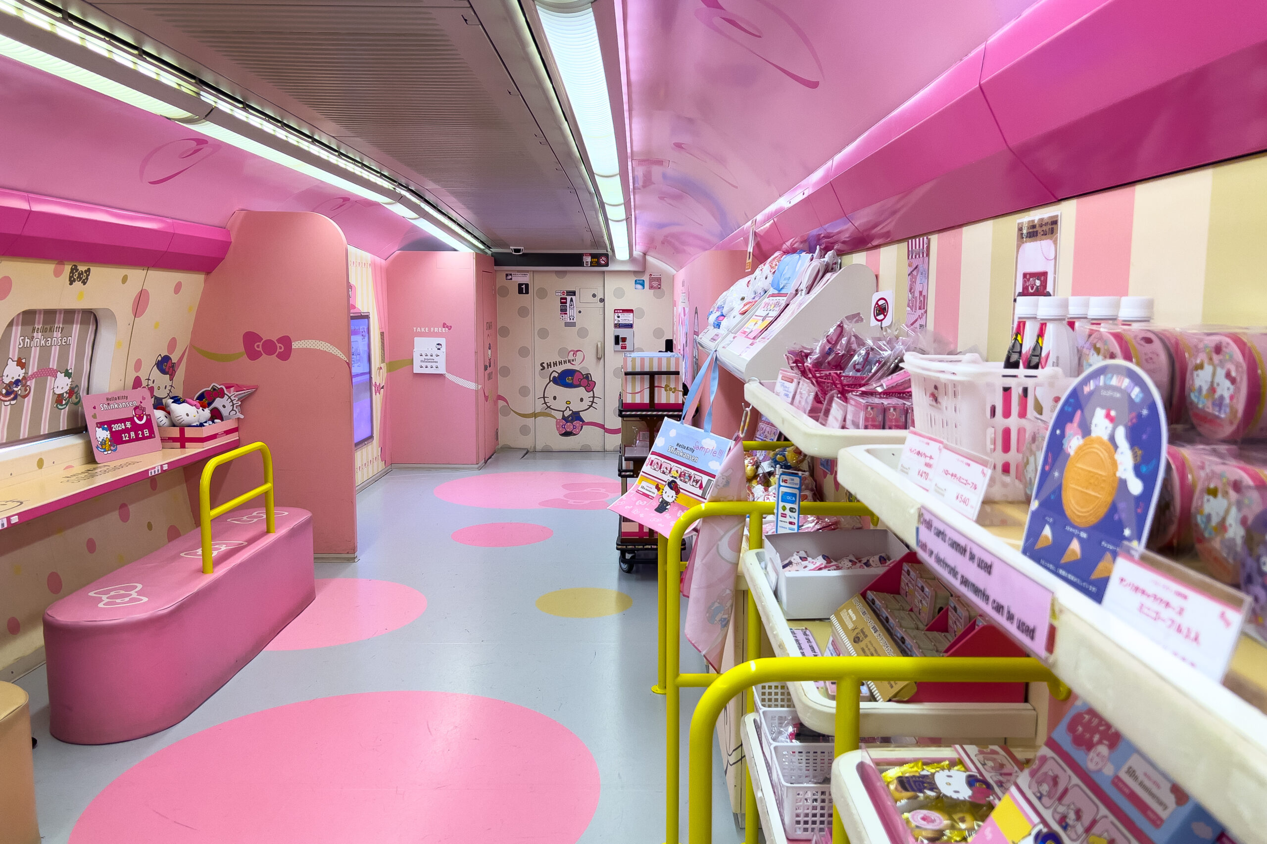 Shelves of Hello Kitty merchandise in the playful shop carriage on the Hello Kitty Shinkansen train in Japan.